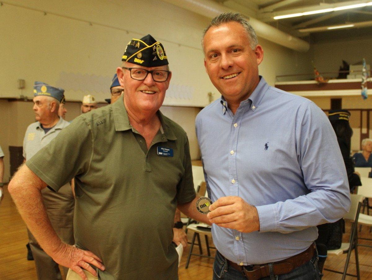 Rep. Gray with a veteran in California's 13th district.